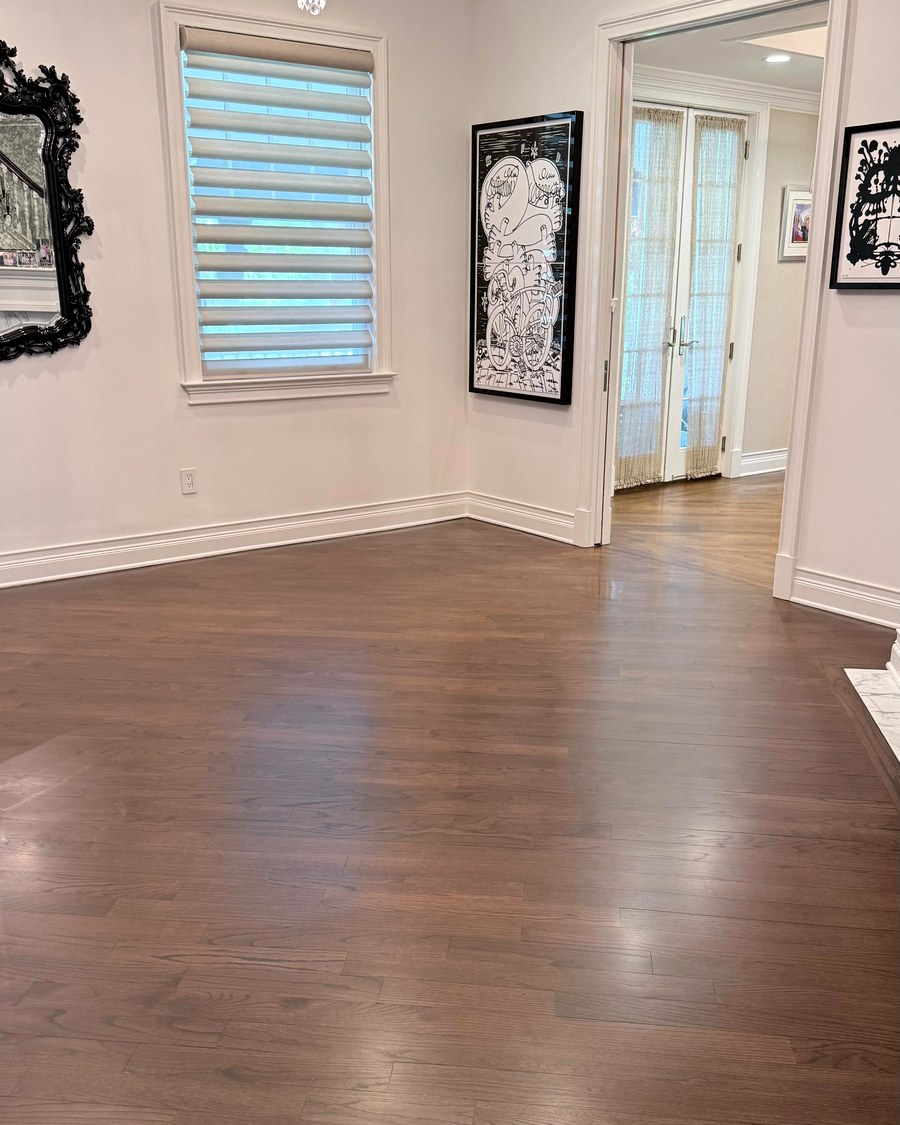 Rich, dark hardwood installed in a formal living space.