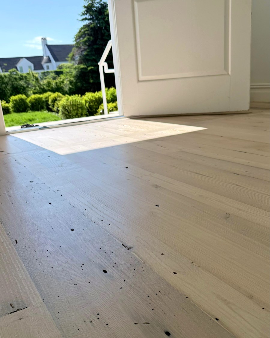 A freshly sanded floor, prepped and ready for its finish coat.